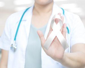 What is the average settlement for lung cancer caused by asbestos exposure?