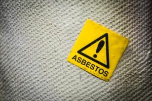 How are asbestos cases paid out?