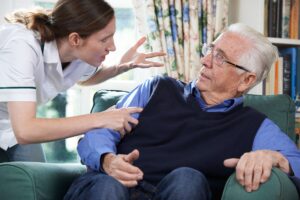What are some tactics that emotionally abusive nursing home employees use