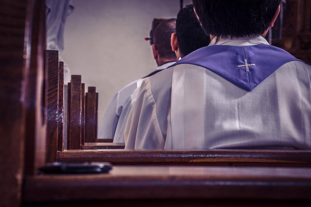 Clergy participating in a religious ceremony.