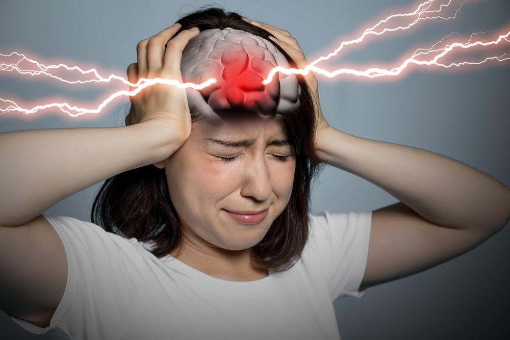 Woman in pain from a brain hemorrhage