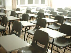 Empty desks in a classroom.